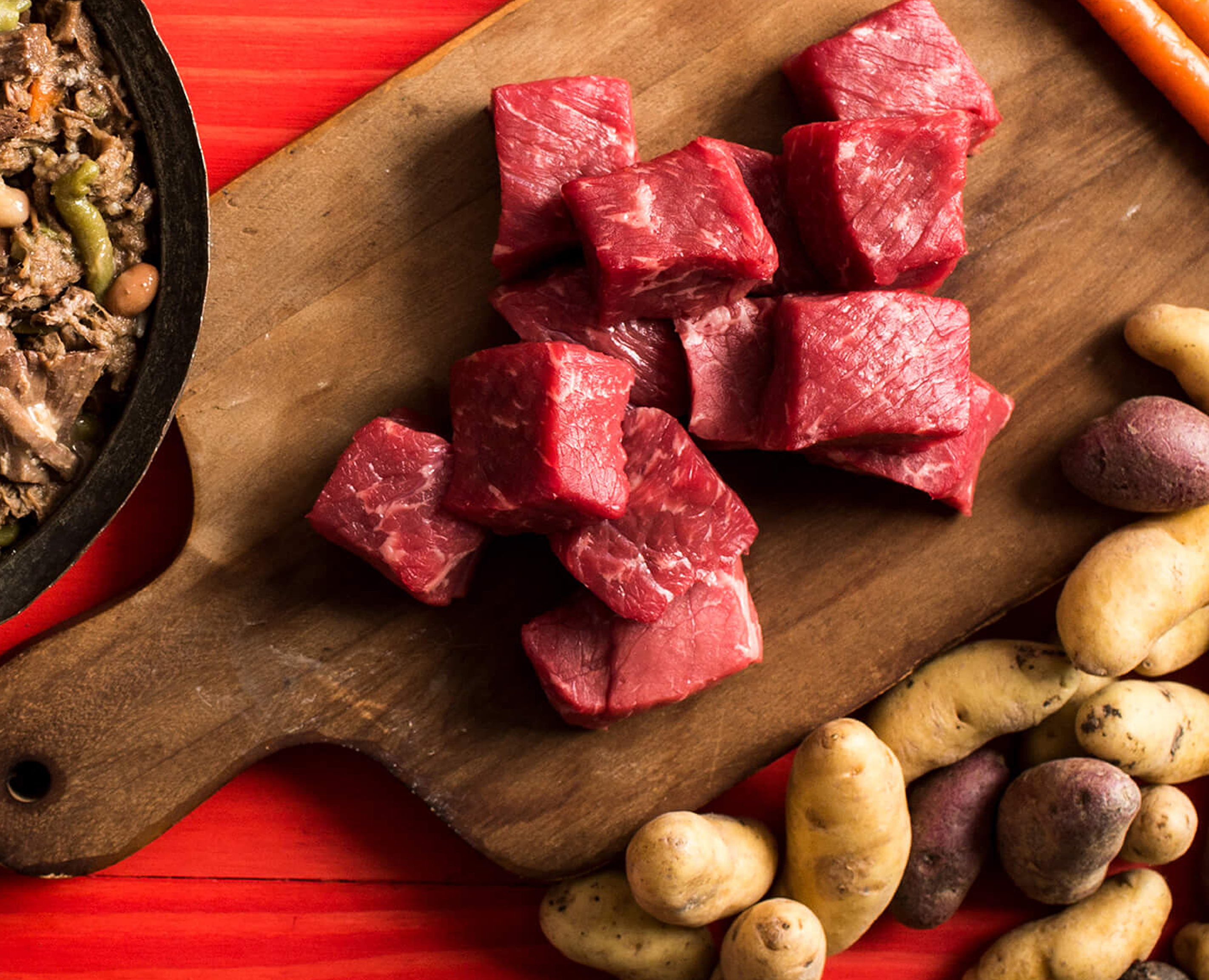 Premium ingredients with beef and potatoes pictured