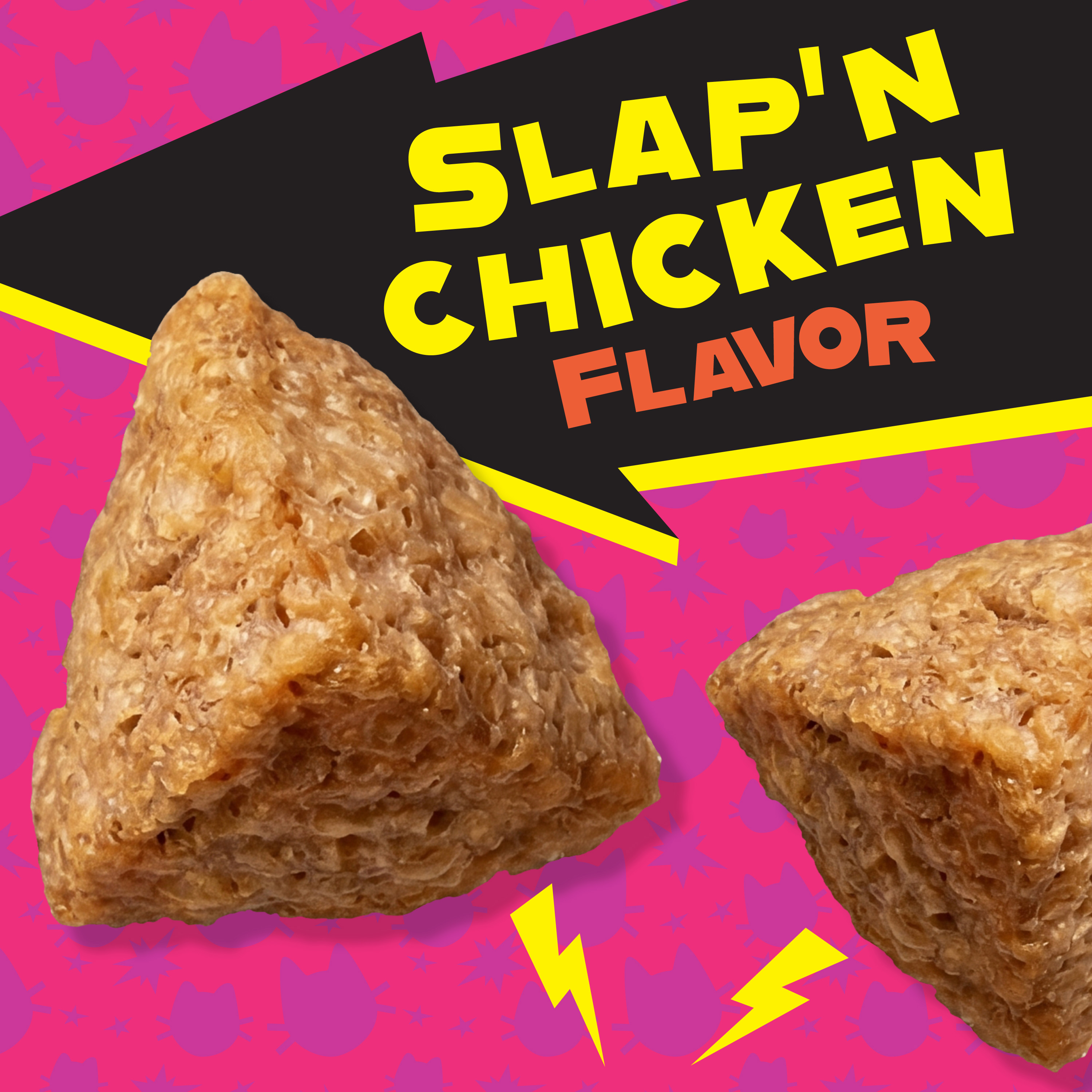 Slap'n Chicken Flavor. Enlarged image of cat treat with a bright pink patterned background.