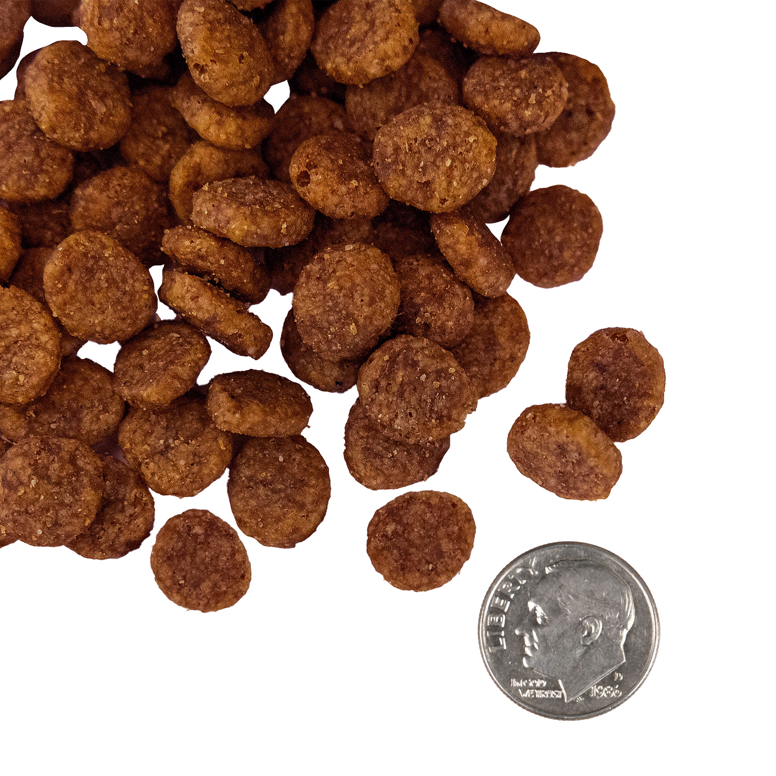 A small pile of Nutritionals Mobility Chicken & Whole Oats Recipe kibble next to a dime for scale.