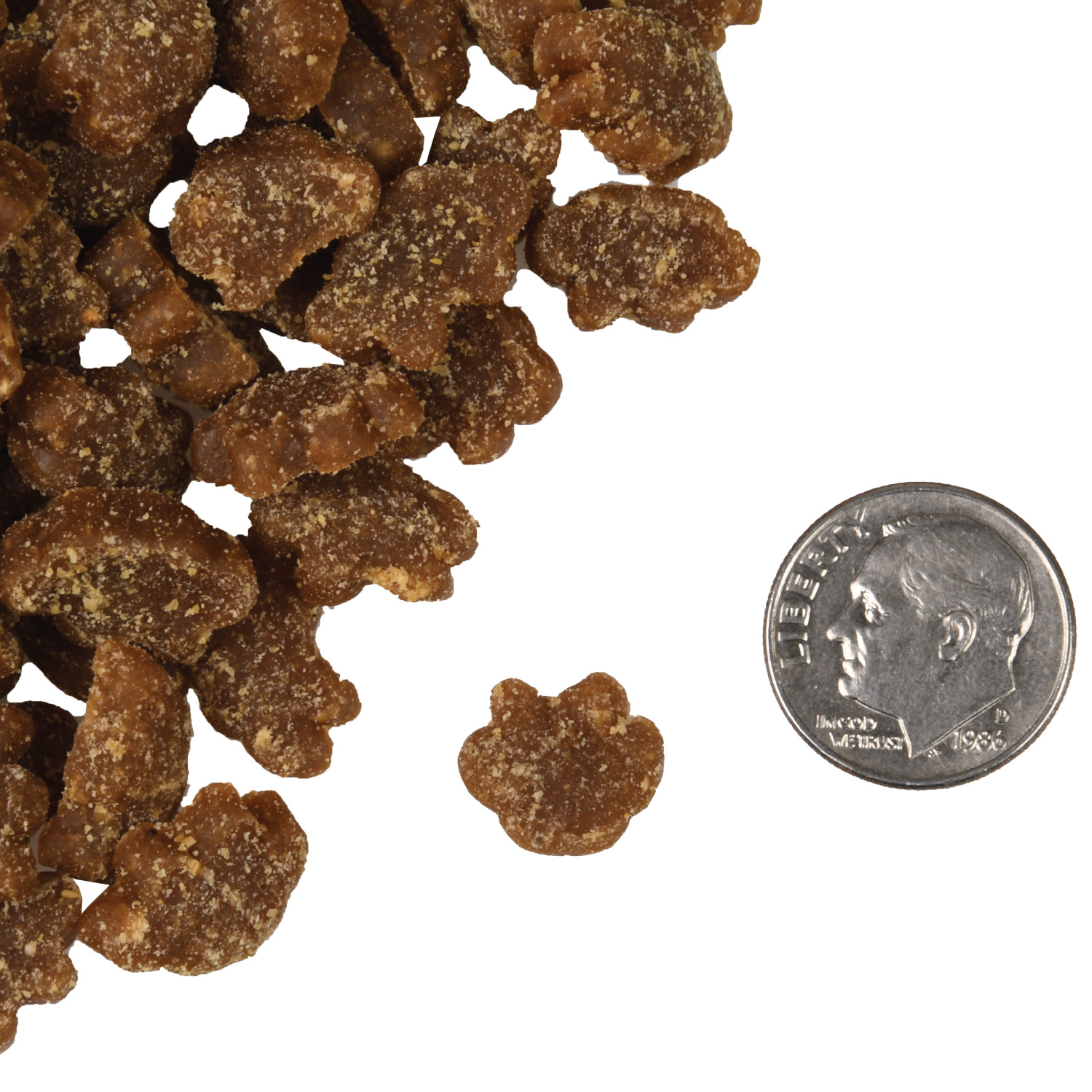 A small pile of PurrSnackitty Salmon Flavor Snackitties treats next to a dime for scale.