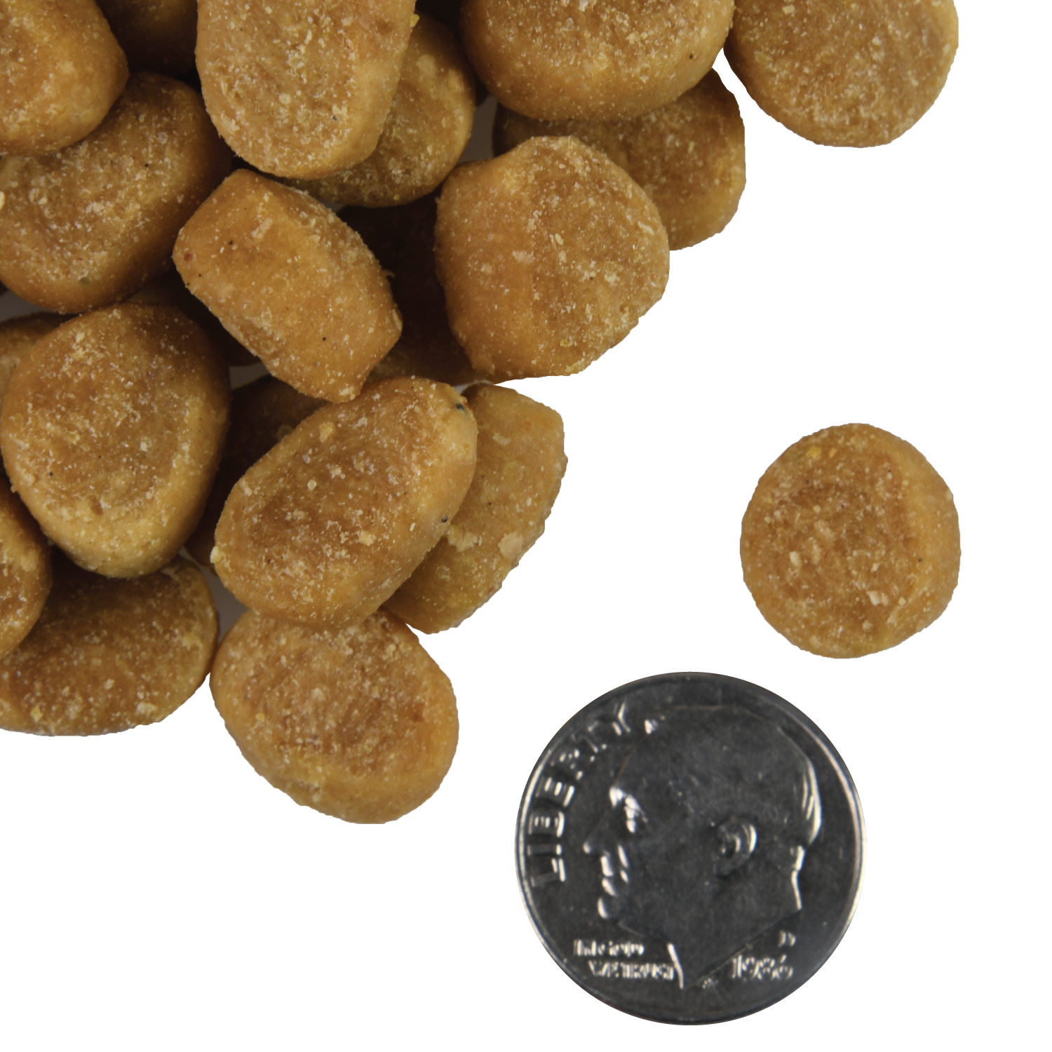 A small pile of Tenderollies Chick-a-Rollie Flavor Dog treats next to a dime for scale.
